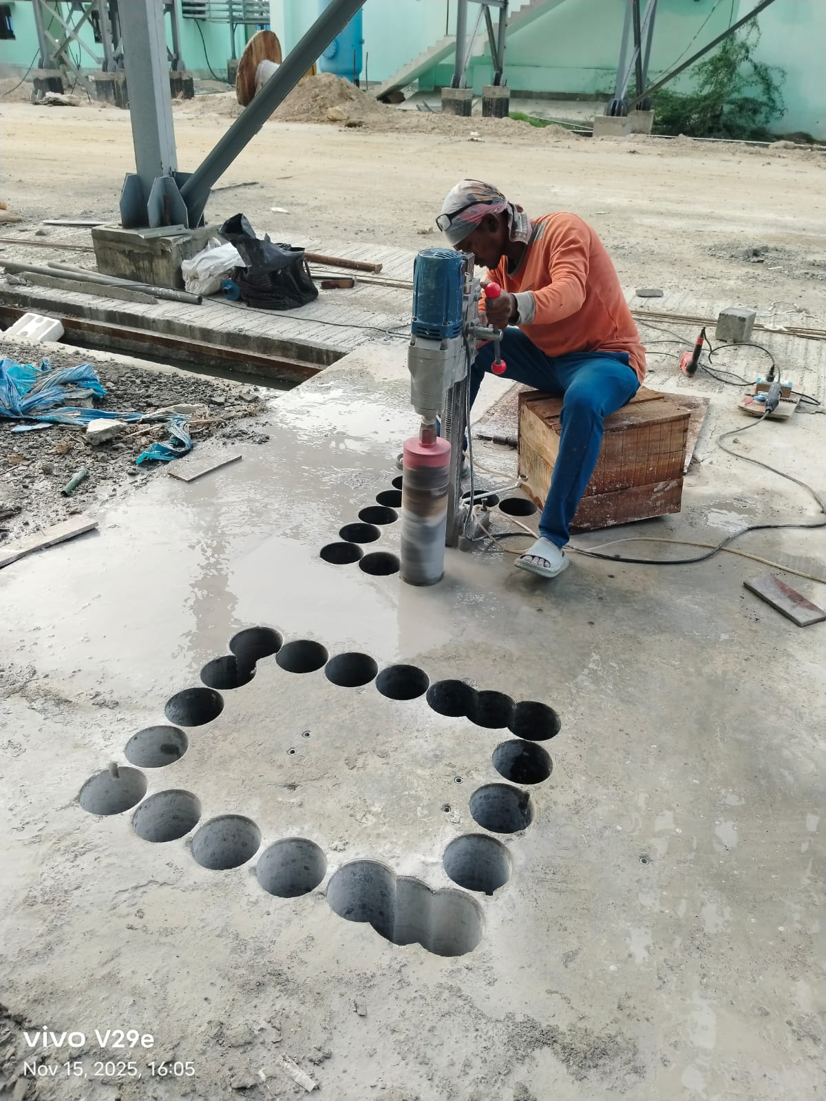 SRI Cutting Technologies operator performing diamond core drilling in an RCC slab
